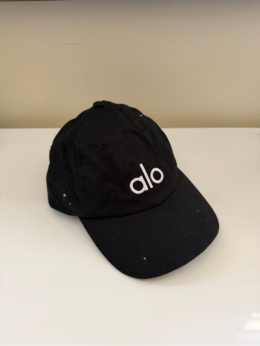ALO Yoga Black Cap with White 'alo' Embroidery